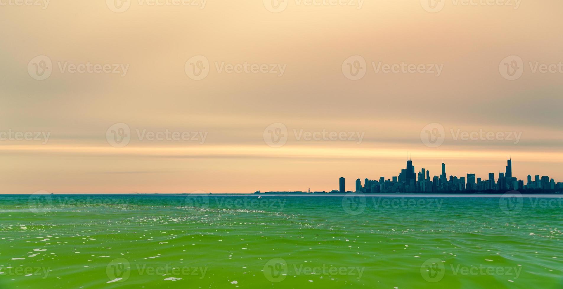 Shot of Lake Michigan and the Chicago skyline with azure hues and a beautiful sky. photo