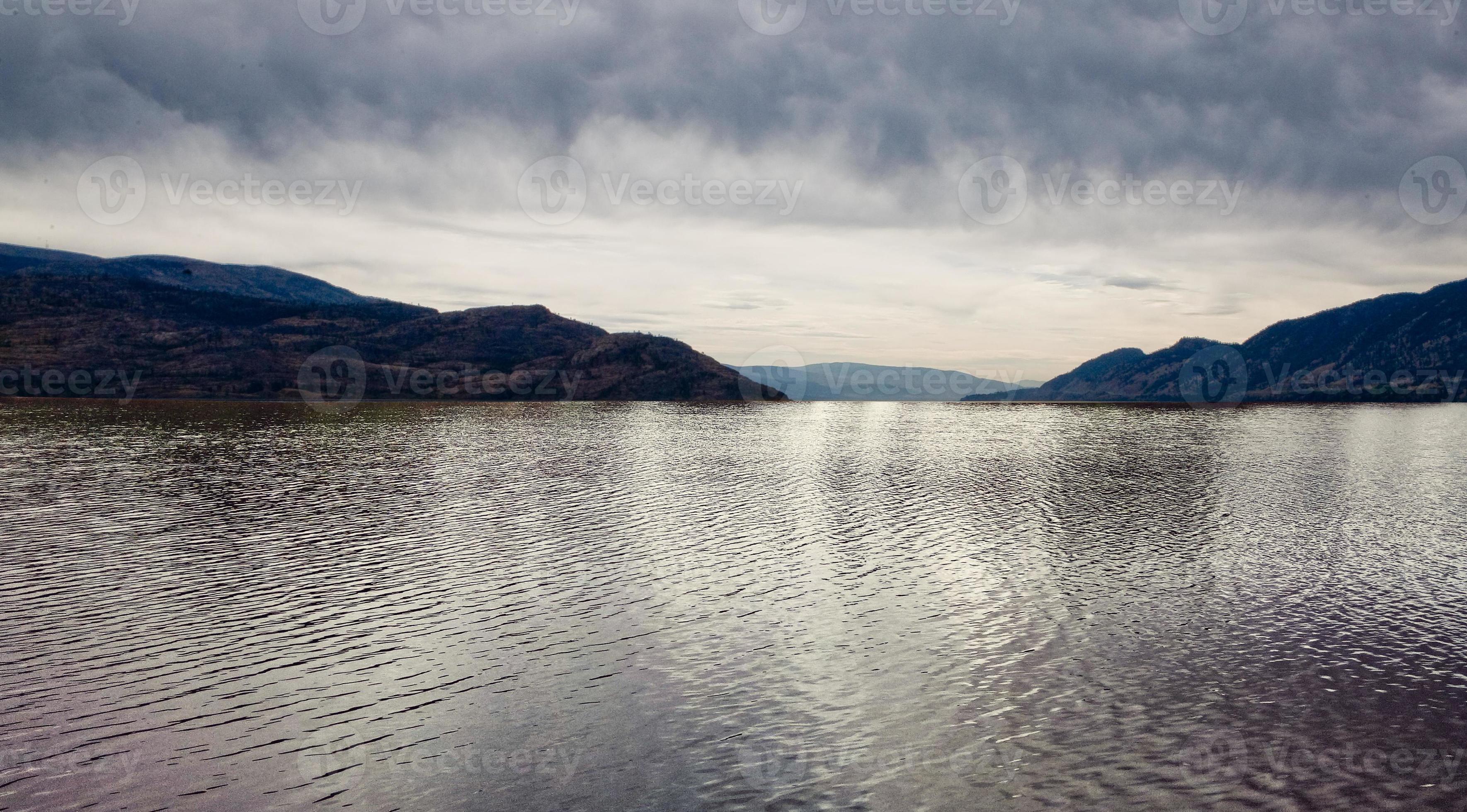 Lake Okanagan, accompanied by a beautiful sky, shot from the deep lake in  British Columbia's Okanagan Valley, Canada. 14882077 Stock Photo at Vecteezy