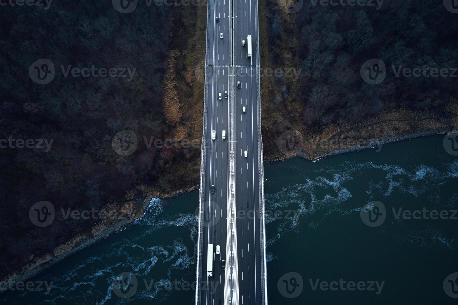 Aerial view of highway bridge with moving cars photo