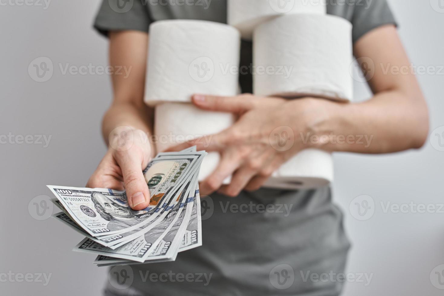 Woman buy a lot of toilet paper rolls photo