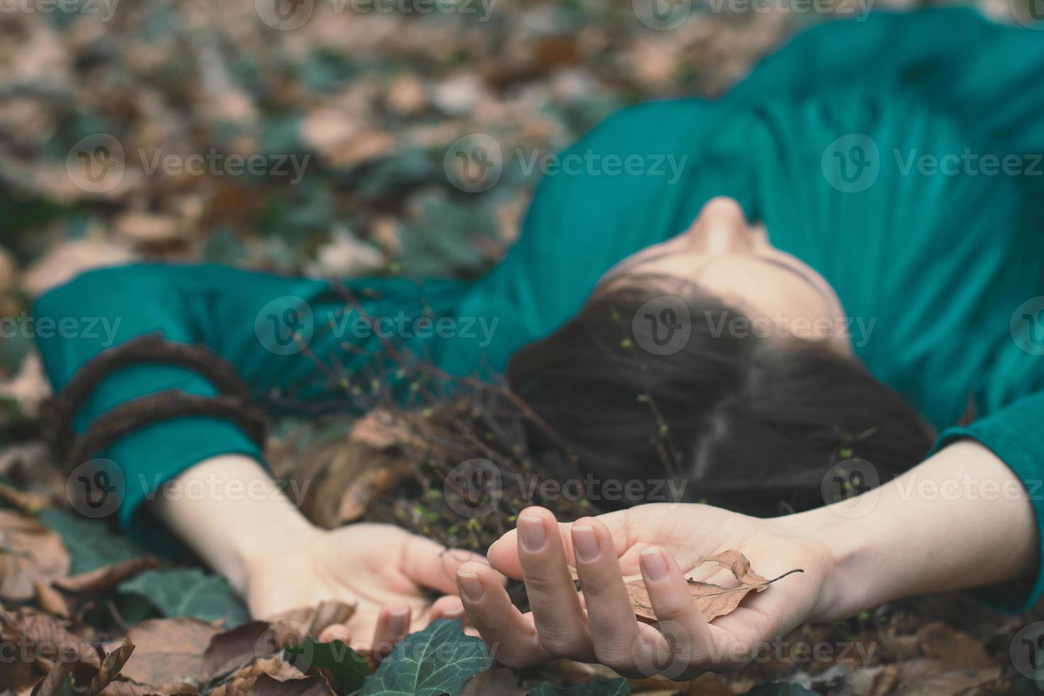 Close up lady lying on ground concept photo