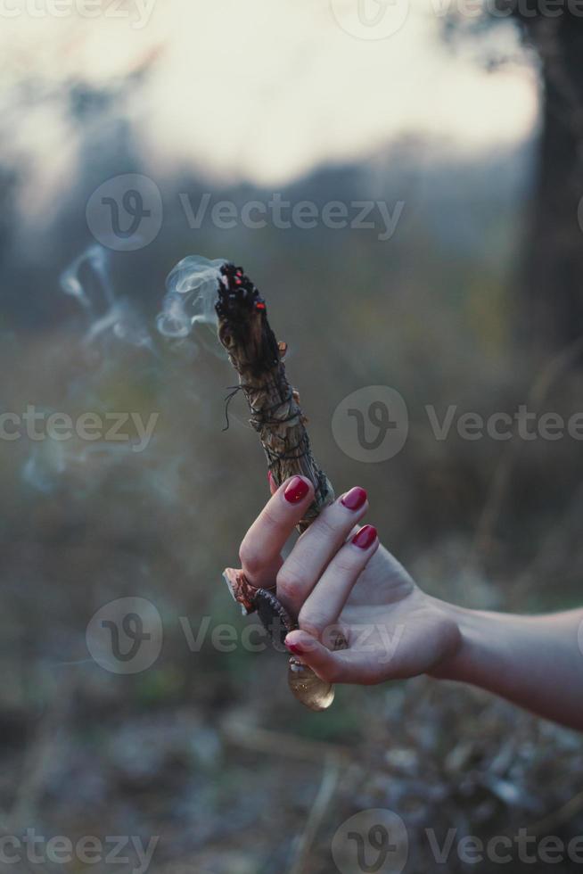 Close up smudging ritual concept photo