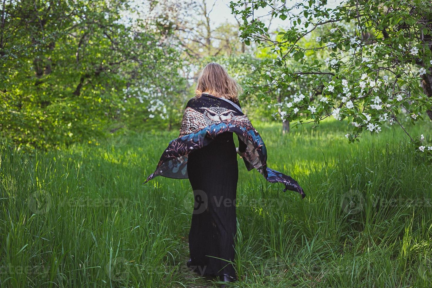 Lady running in beautiful garden scenic photography photo