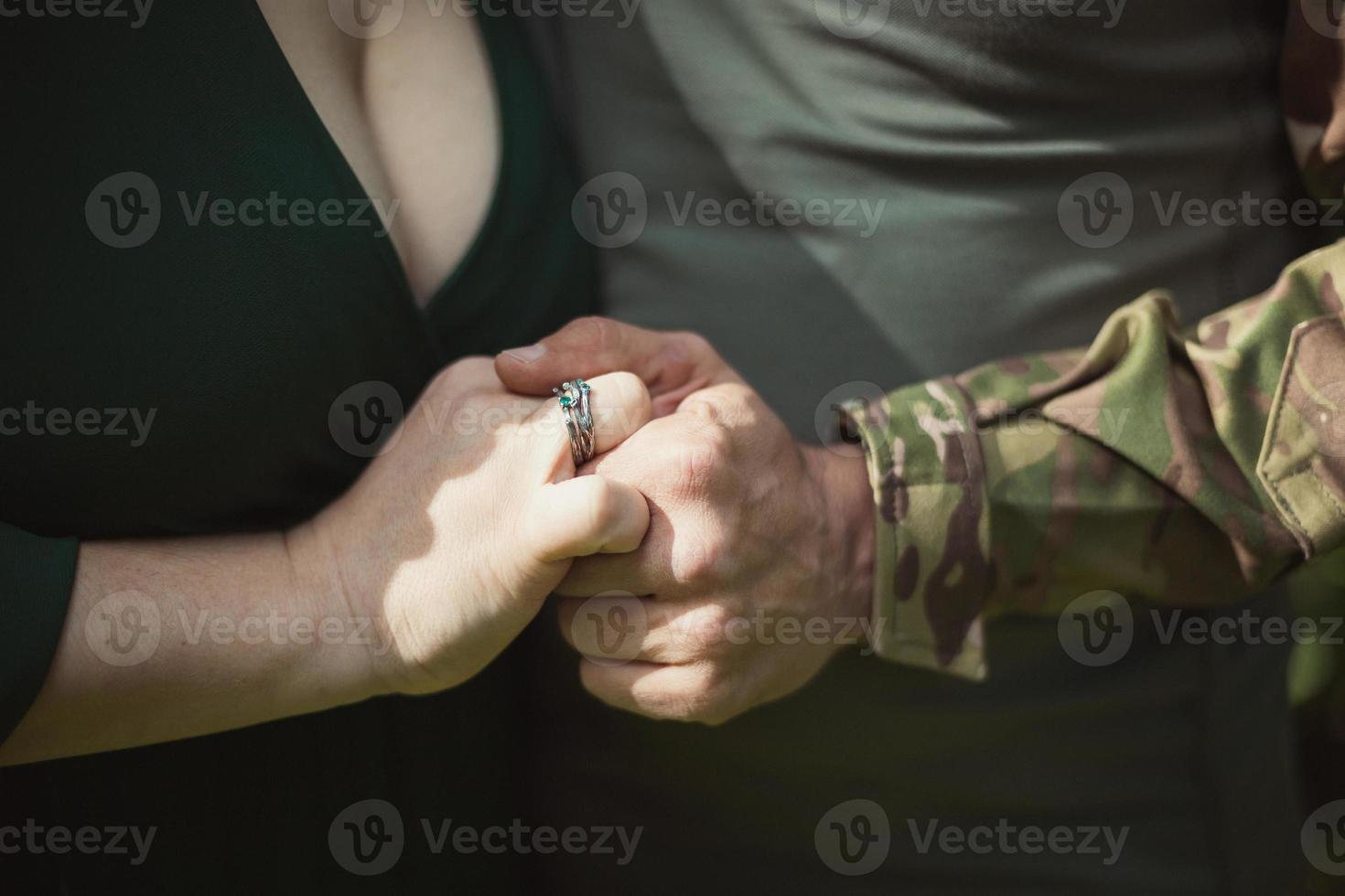 Close up married couple hands concept photo