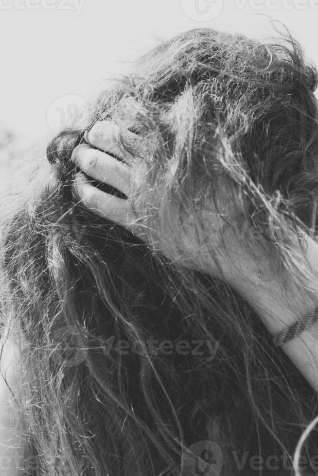 Close up woman hair flowing monochrome concept photo