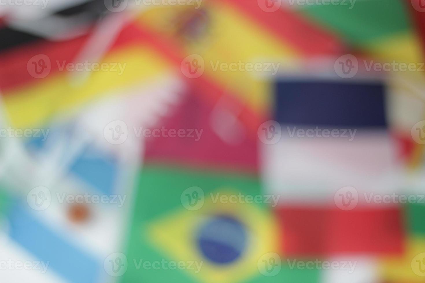 Leather soccer ball with international team flags of the participating countries in the championship tournament isolated on white background. Football equipment competitive game. World cup concept. photo