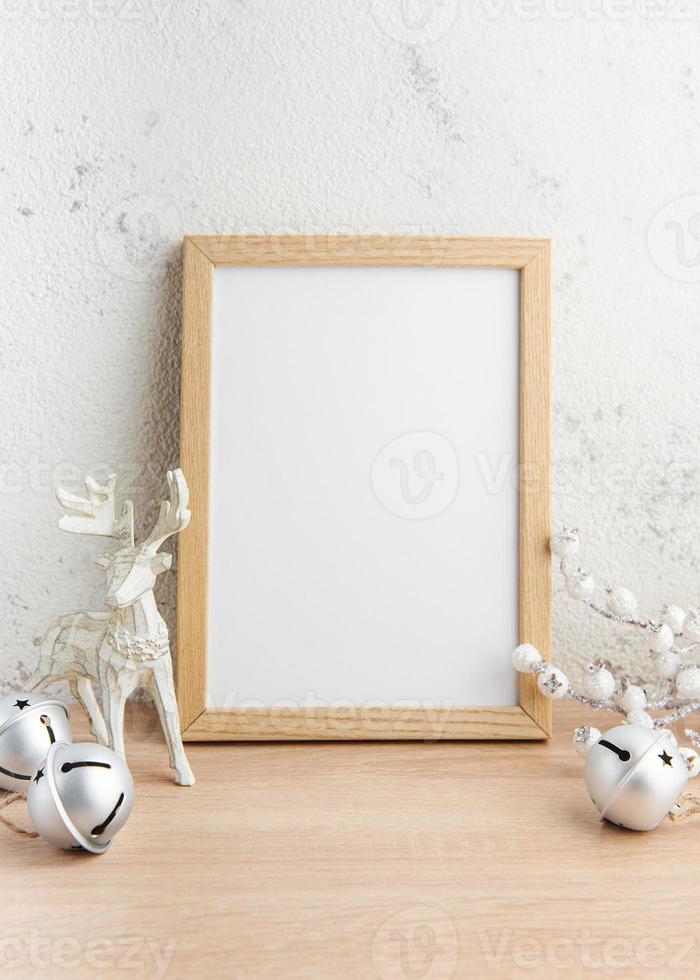 White blank wooden frame mockup with Christmas decorations photo