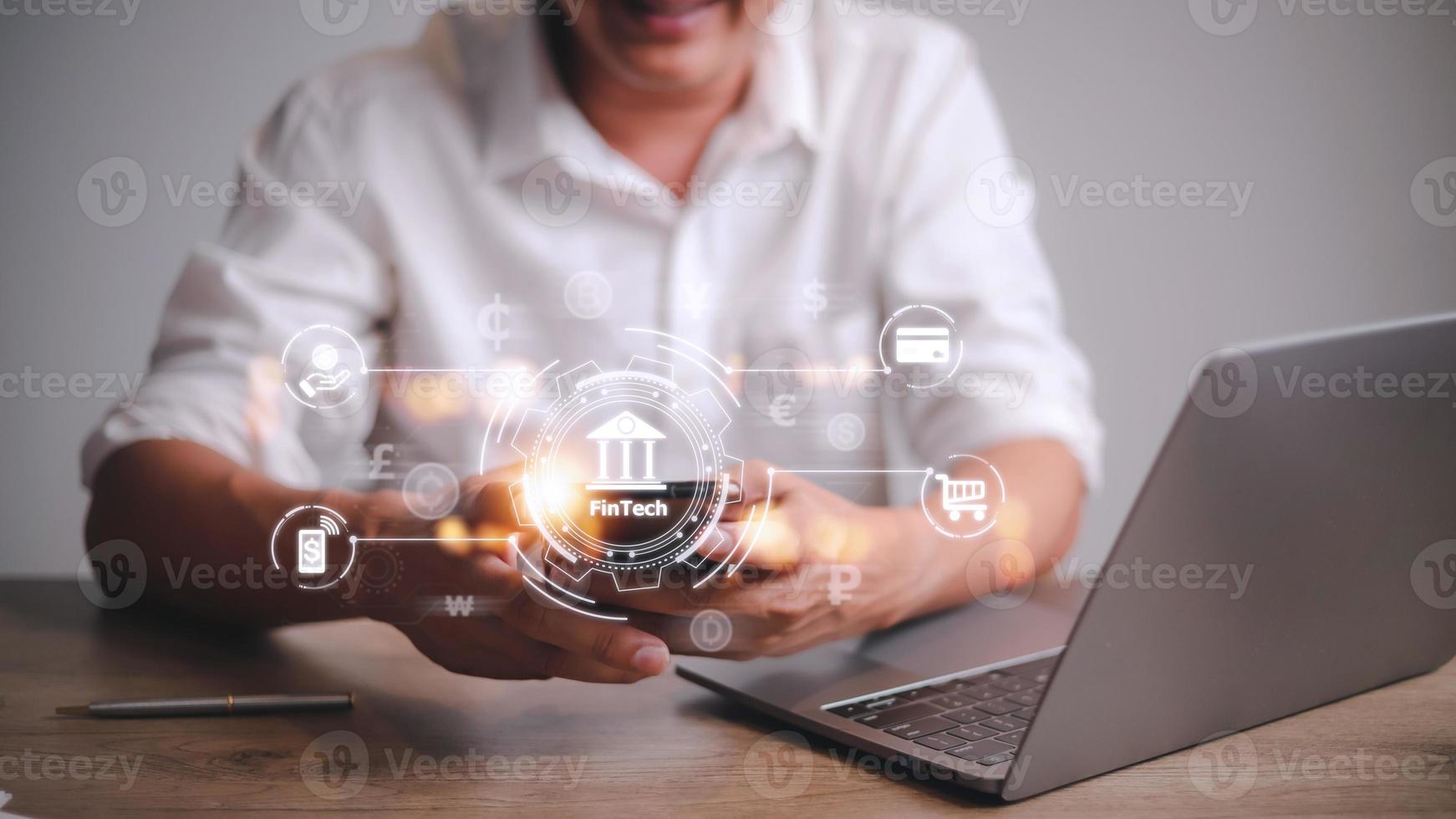 Future of financial technology concept businessman selecting fintech word photo