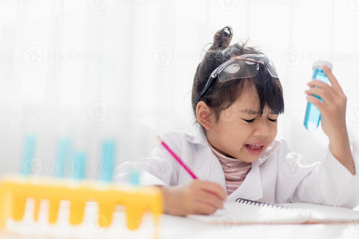 Asian child girl sick with sneezing on the nose and cold cough because