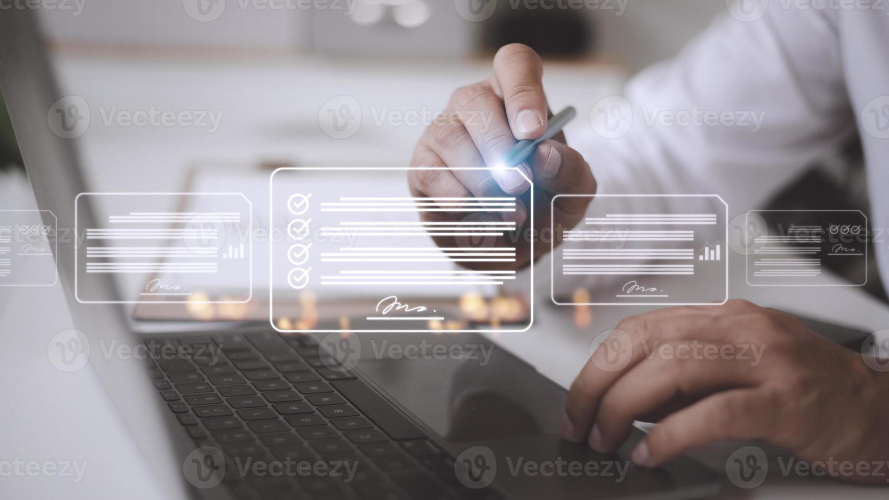 Paperless workplace ideas, e-signing, electronic signature, document management. A businessman signs an electronic document on a digital document on a virtual screen using a stylus pen. photo