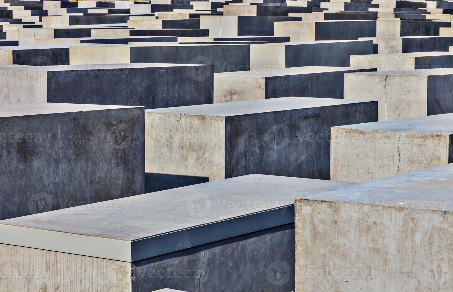 View on concrete blocks of Holocaust memorial in Berlin in summer photo