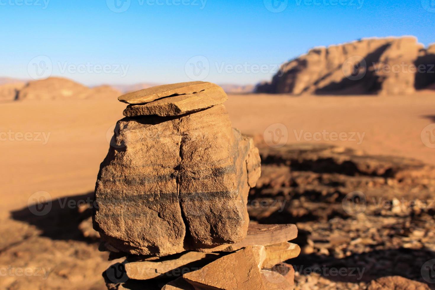 Rock piles in the desert at wadi rum Jordan photo