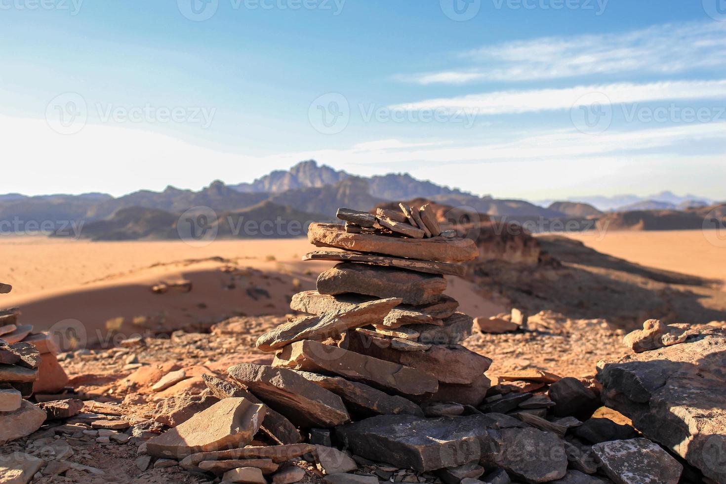 Rock piles in the desert at wadi rum Jordan photo