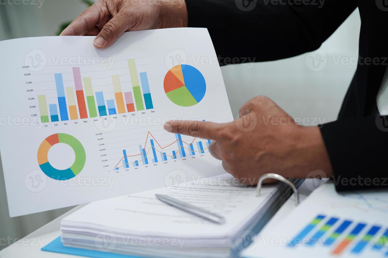 Business woman working and analysis with statistic graph in office. photo