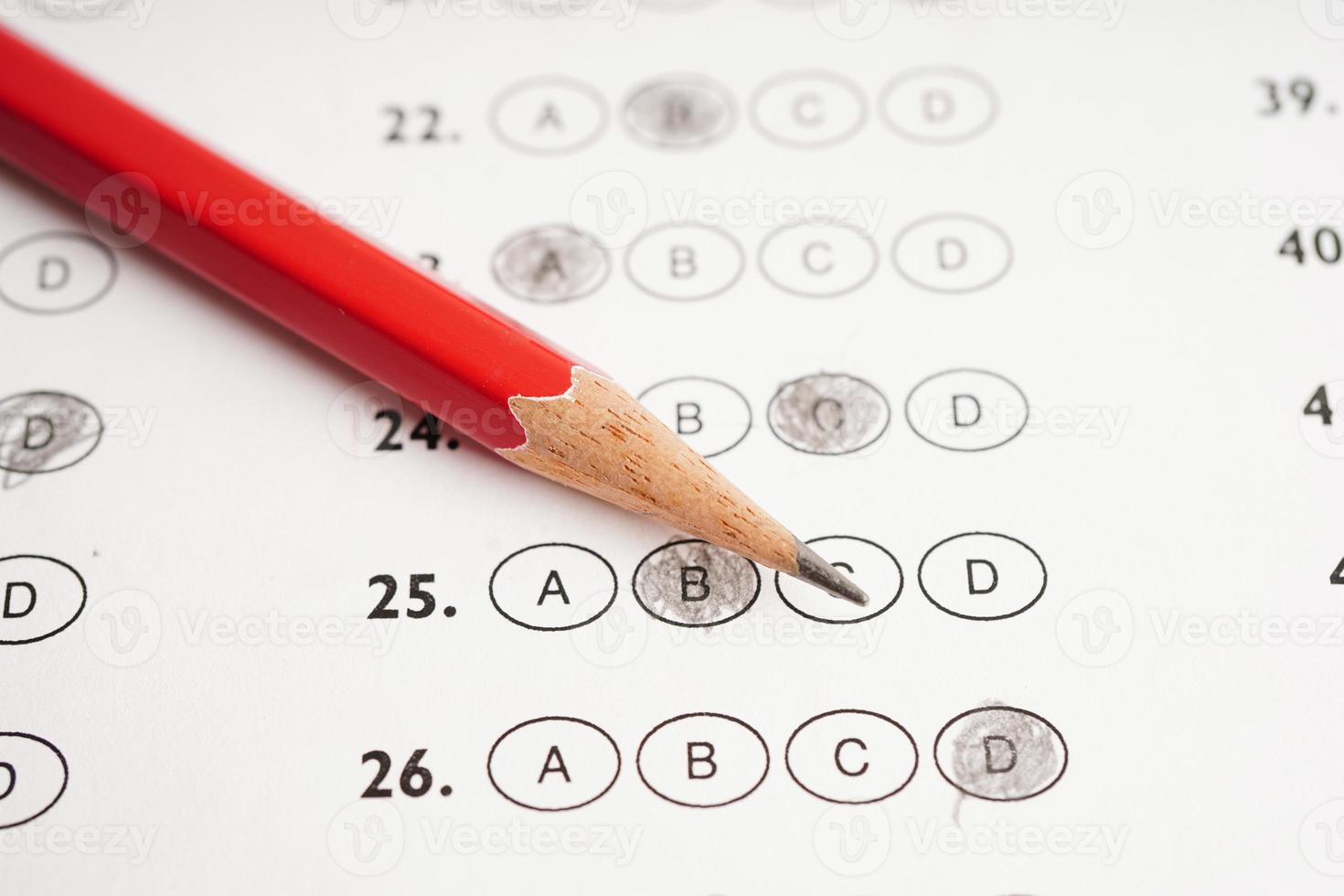 Answer sheets with pencil drawing fill to select choice, education concept. photo