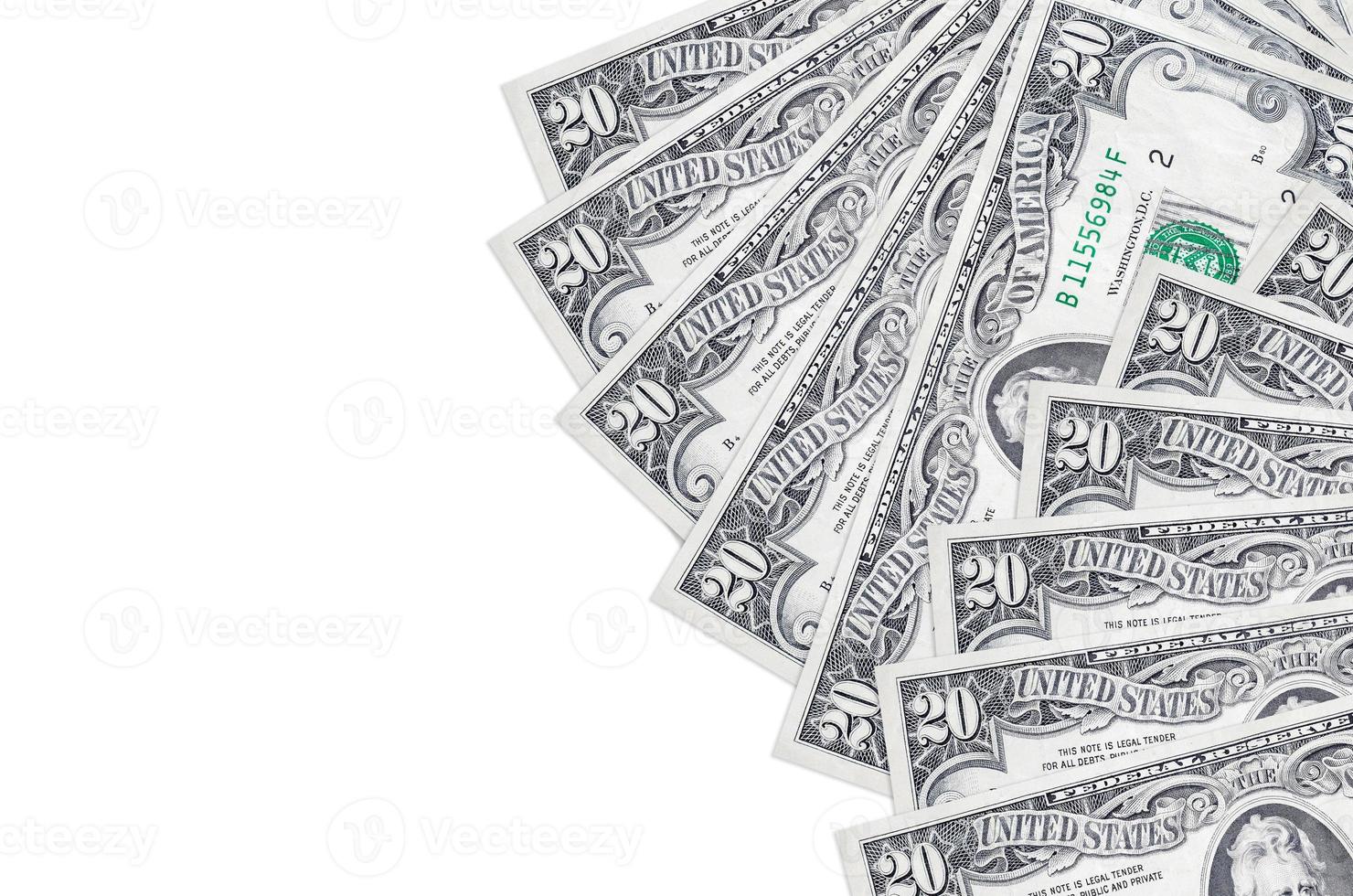20 US dollars bills lies isolated on white background with copy space. Rich life conceptual background photo