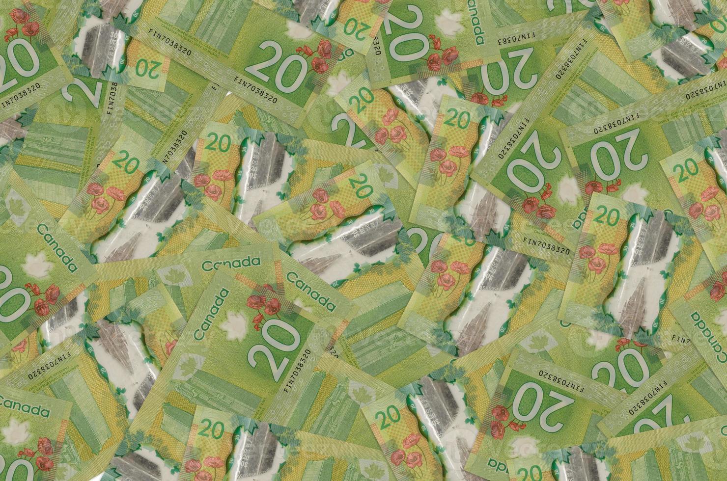 20 Canadian Dollars Bills Lies In Big Pile Rich Life Conceptual 20-canadian-dollars-bills-lies-in-big-pile-rich-life-conceptual