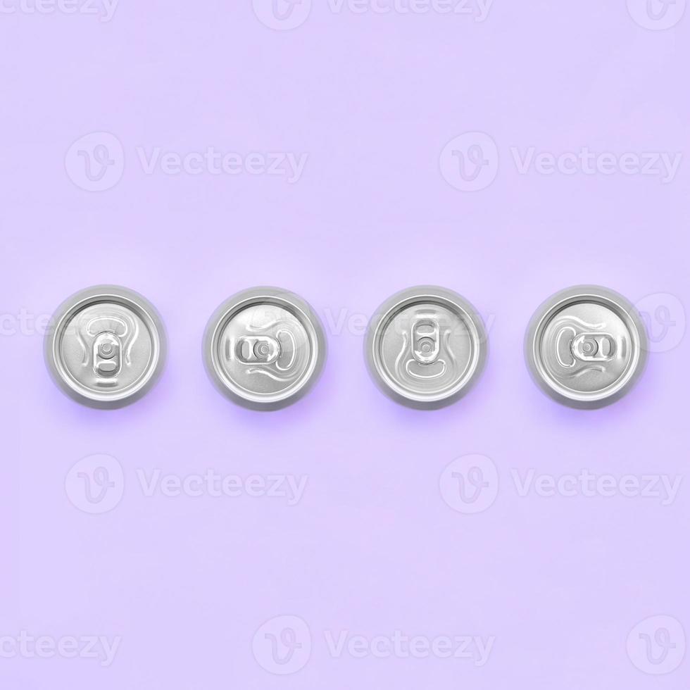 Many metallic beer cans on texture background of fashion pastel violet color paper in minimal concept photo