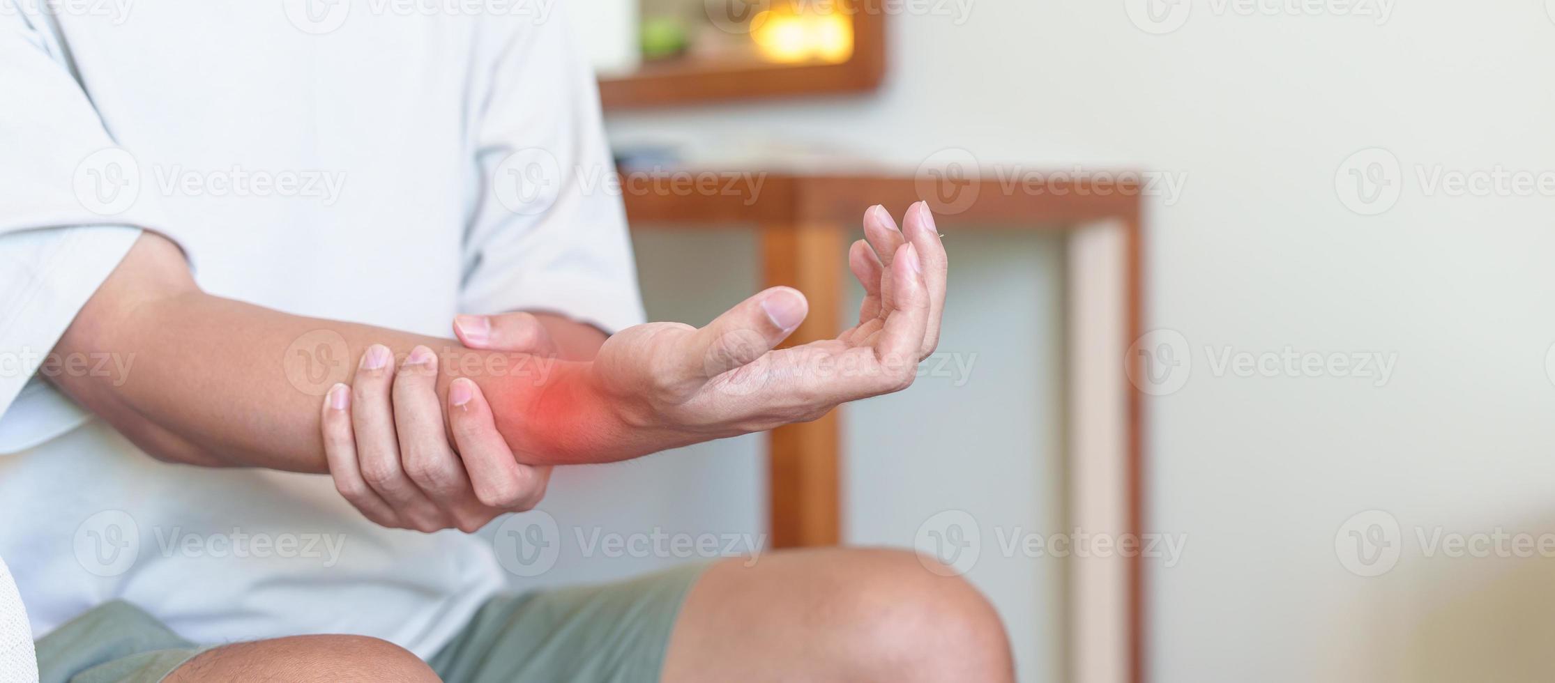 man having wrist pain because using smartphone or computer long time. De Quervain s tenosynovitis, rheumatism, arthritis, osteoarthritis, ergonomic, Carpal Tunnel Syndrome or Office syndrome photo