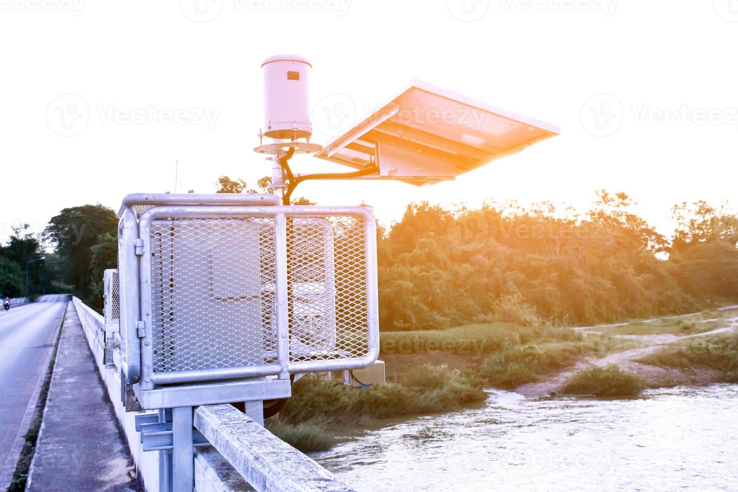 Solar cell system to store and saving the power to use with Rain gauges and flood warnings system near the bridge. photo