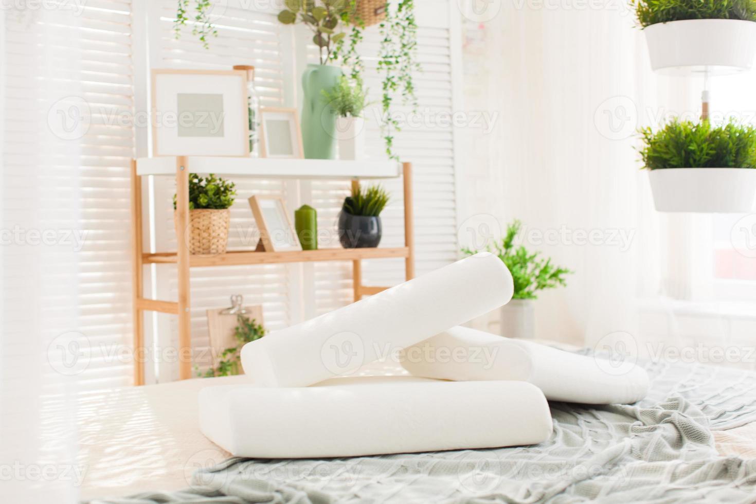 beautiful interior photographs of the modern bedroom, comfortable pillows of orthopedic photo