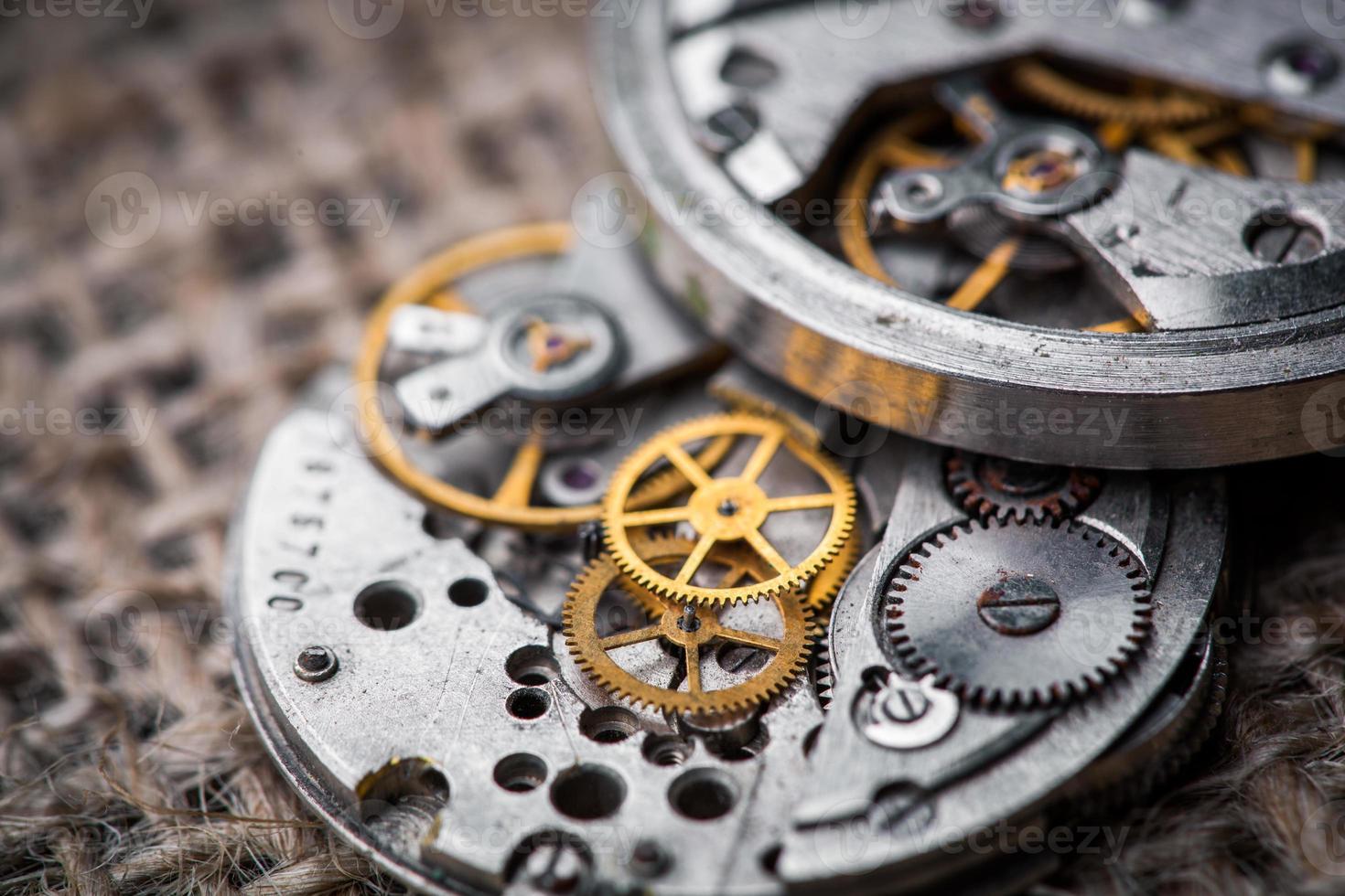 Clockwork old mechanical watch. close up, macro shot photo