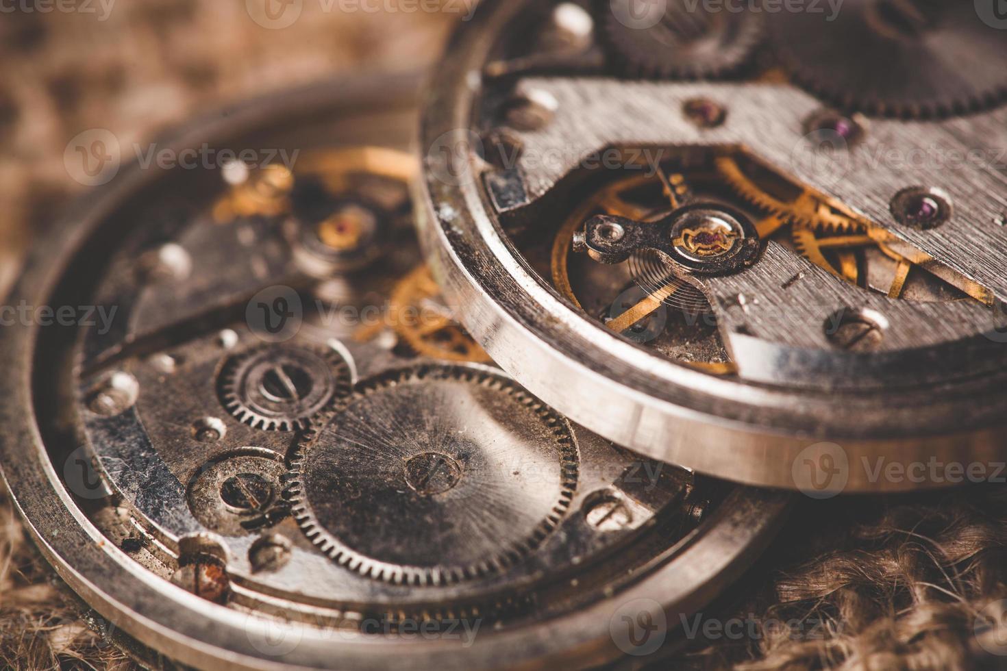 Clockwork old mechanical watch. close up, macro shot photo