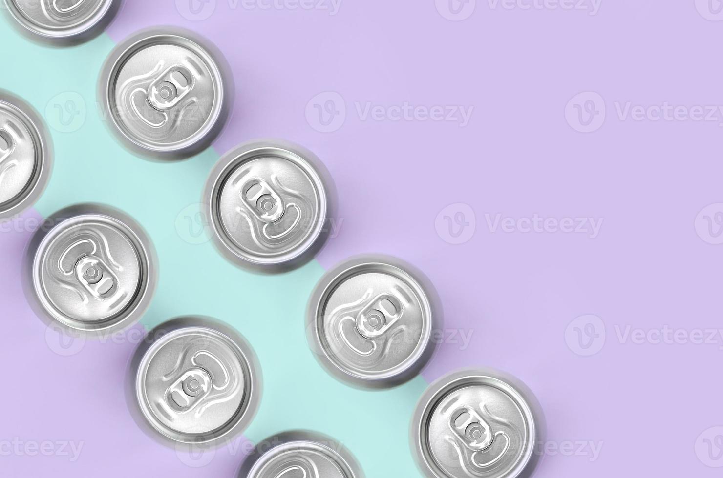 Many metallic beer cans on texture background of fashion pastel violet and blue colors paper in minimal concept photo