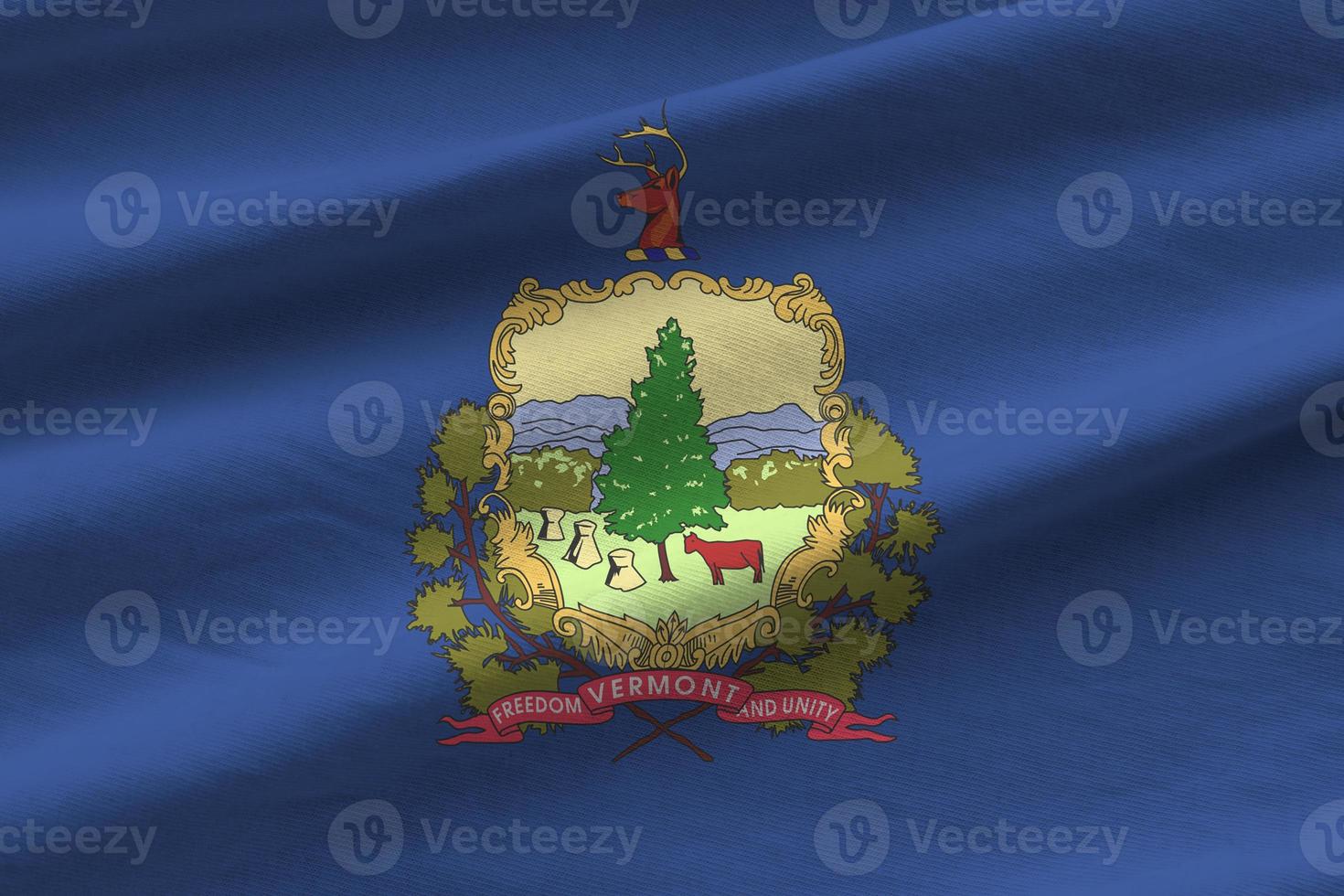 Vermont US state flag with big folds waving close up under the studio light indoors. The official symbols and colors in banner photo