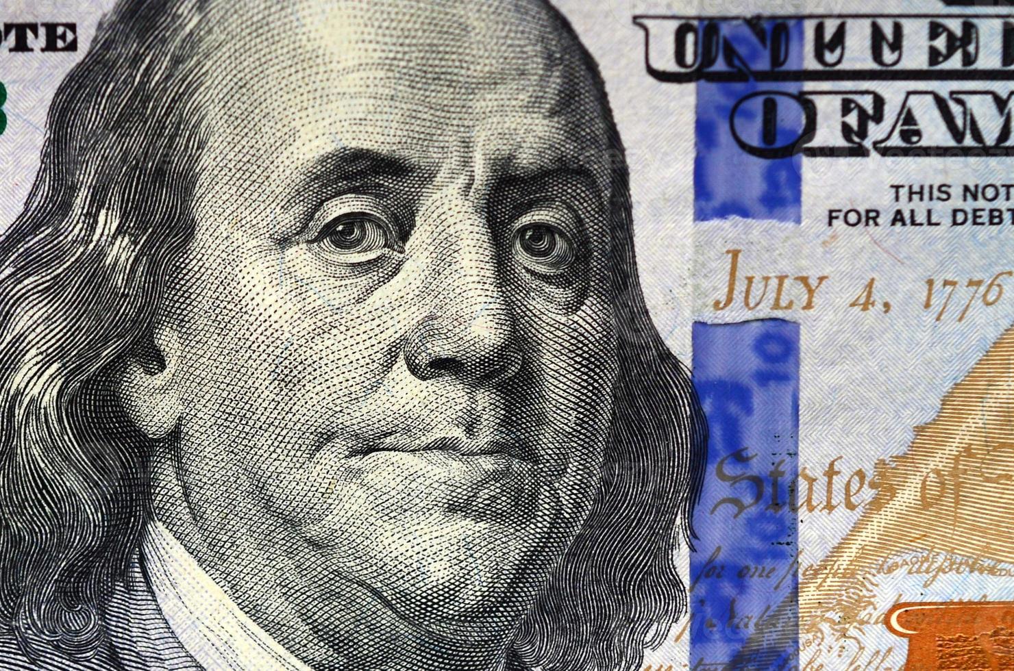 Macro shot. Hundred US dollar bill close up photo