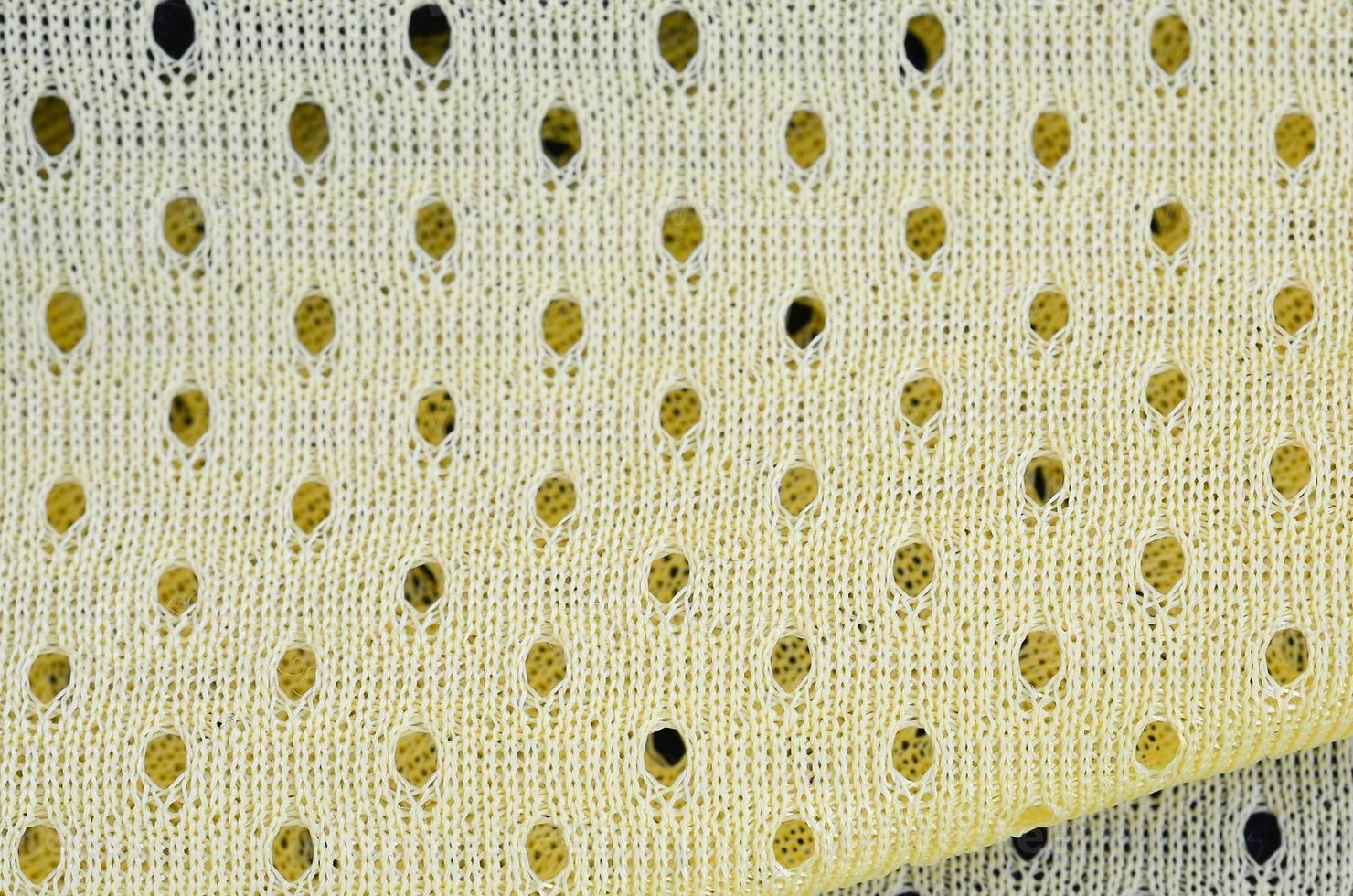 Yellow mesh sport wear fabric textile background pattern photo