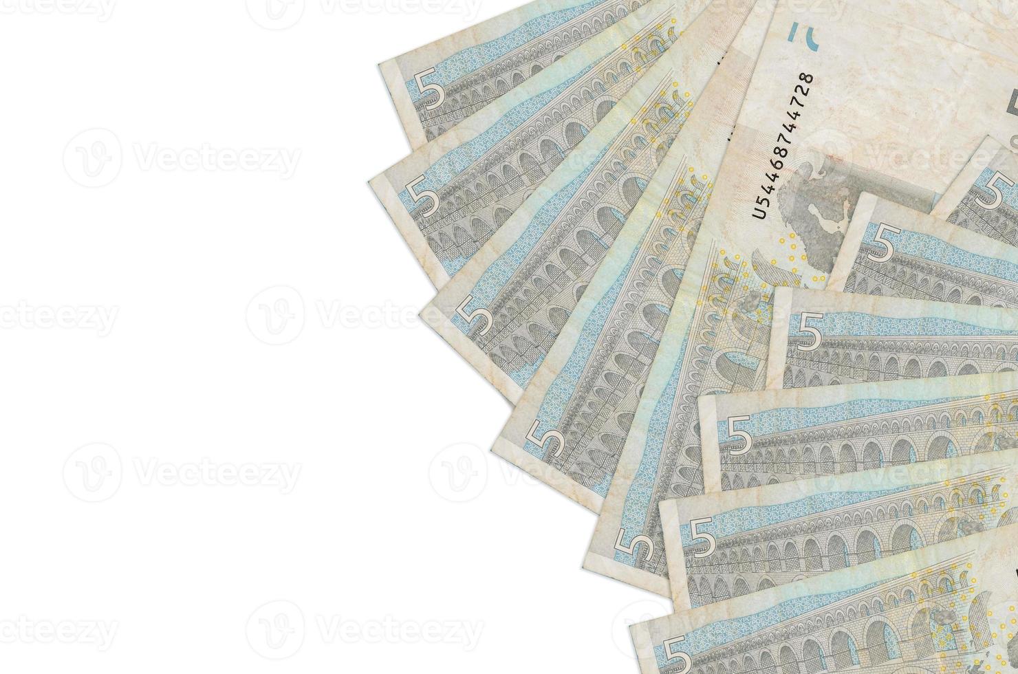 5 euro bills lies isolated on white background with copy space. Rich life conceptual background photo