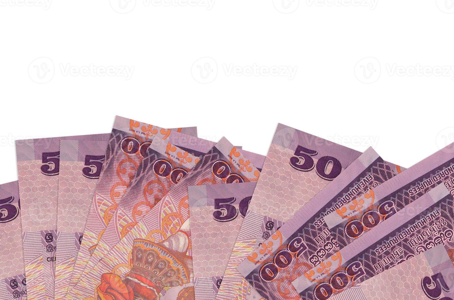 500 Sri Lankan rupees bills lies on bottom side of screen isolated on white background with copy space. Background banner template photo