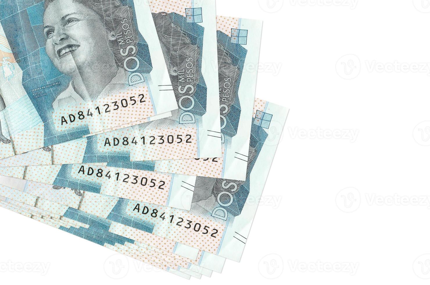 2 Colombian pesos bills lies in small bunch or pack isolated on white. Mockup with copy space. Business and currency exchange photo