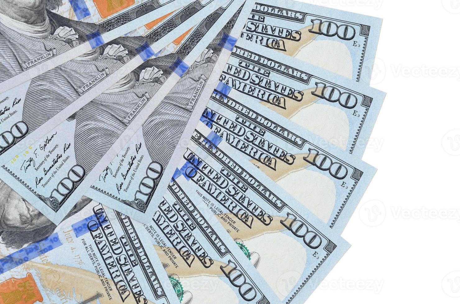 100 US dollars bills lies isolated on white background with copy space stacked in fan shape close up photo