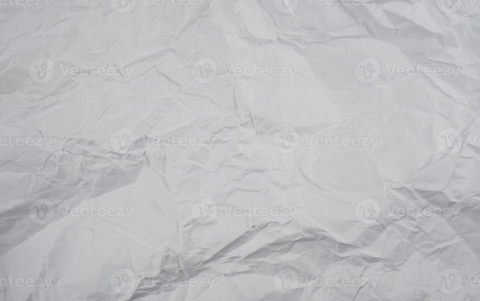 Abstract crumpled paper texture background photo