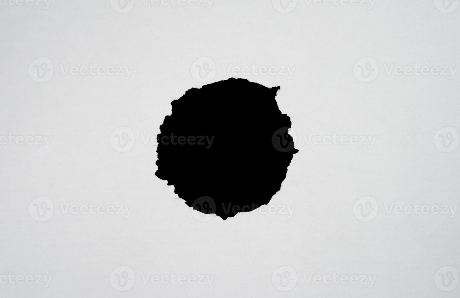 Round torn paper for overlay background. Abstract ripped paper for copy space photo