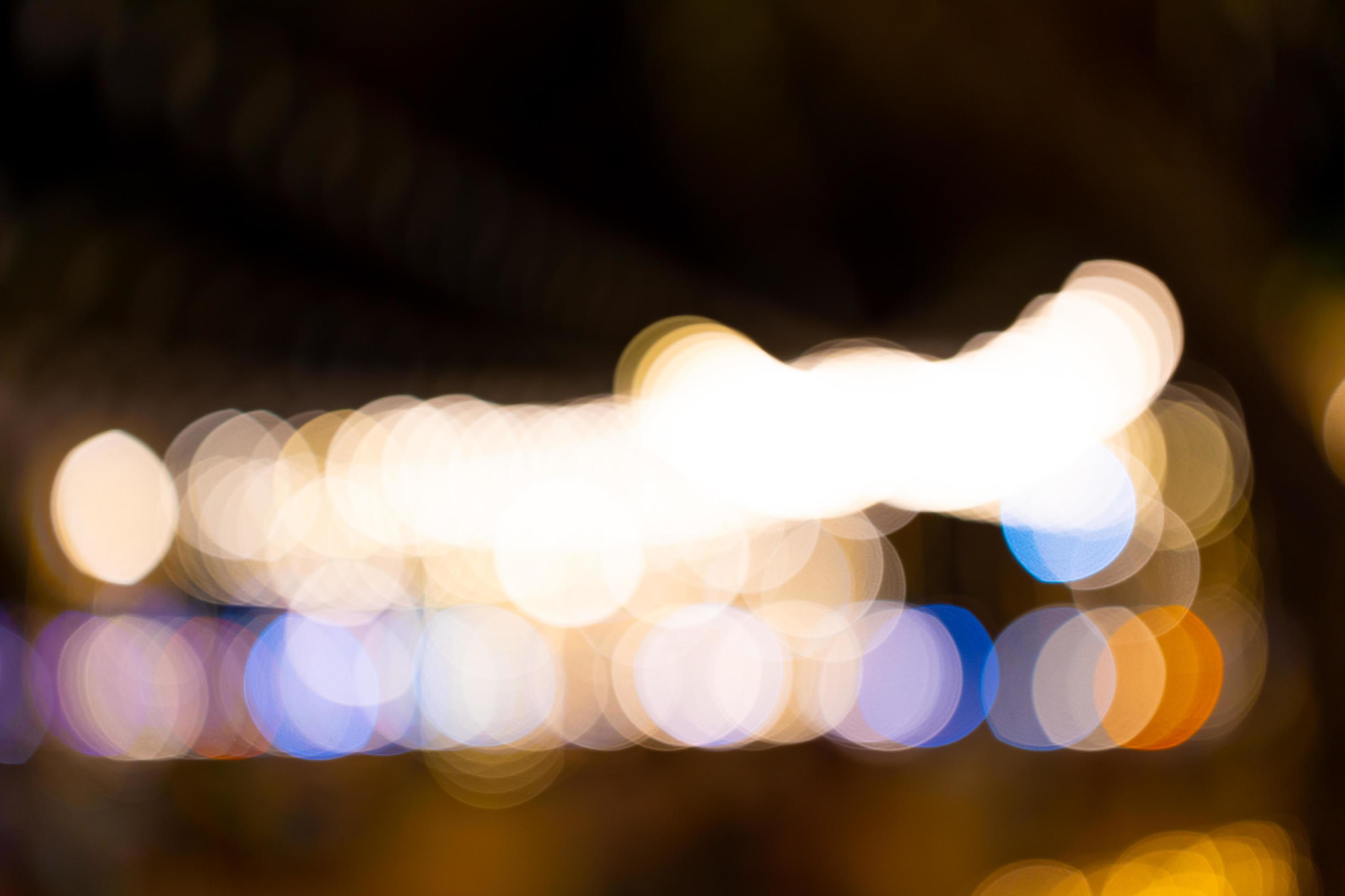 Colorful bokeh abstract background. Noise and gain. Motion blur