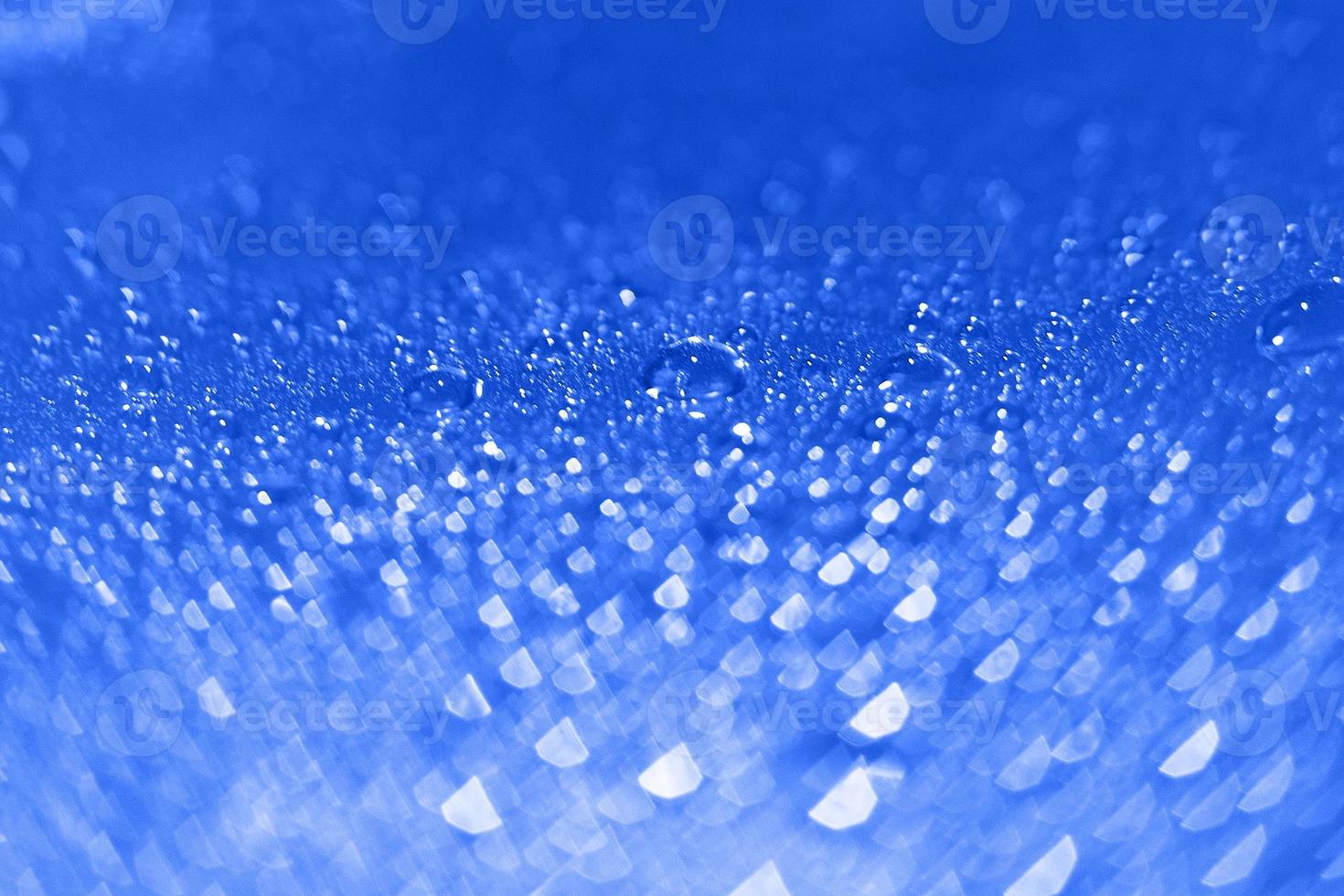 abstract red background with bokeh and  drops of water photo