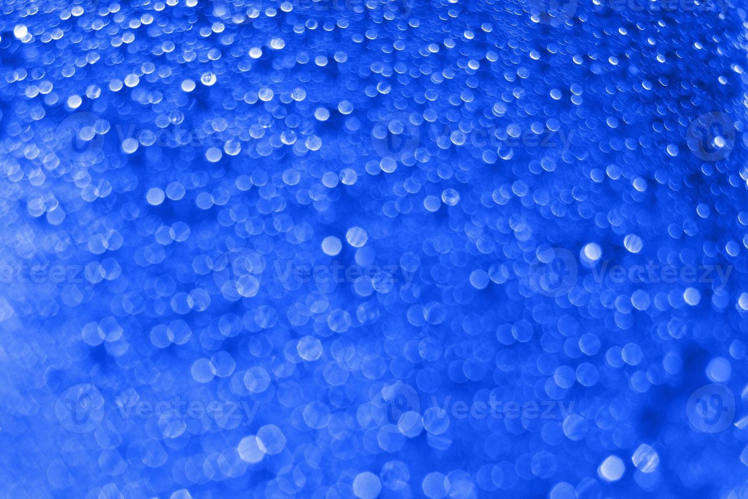 abstract red background with bokeh and  drops of water photo