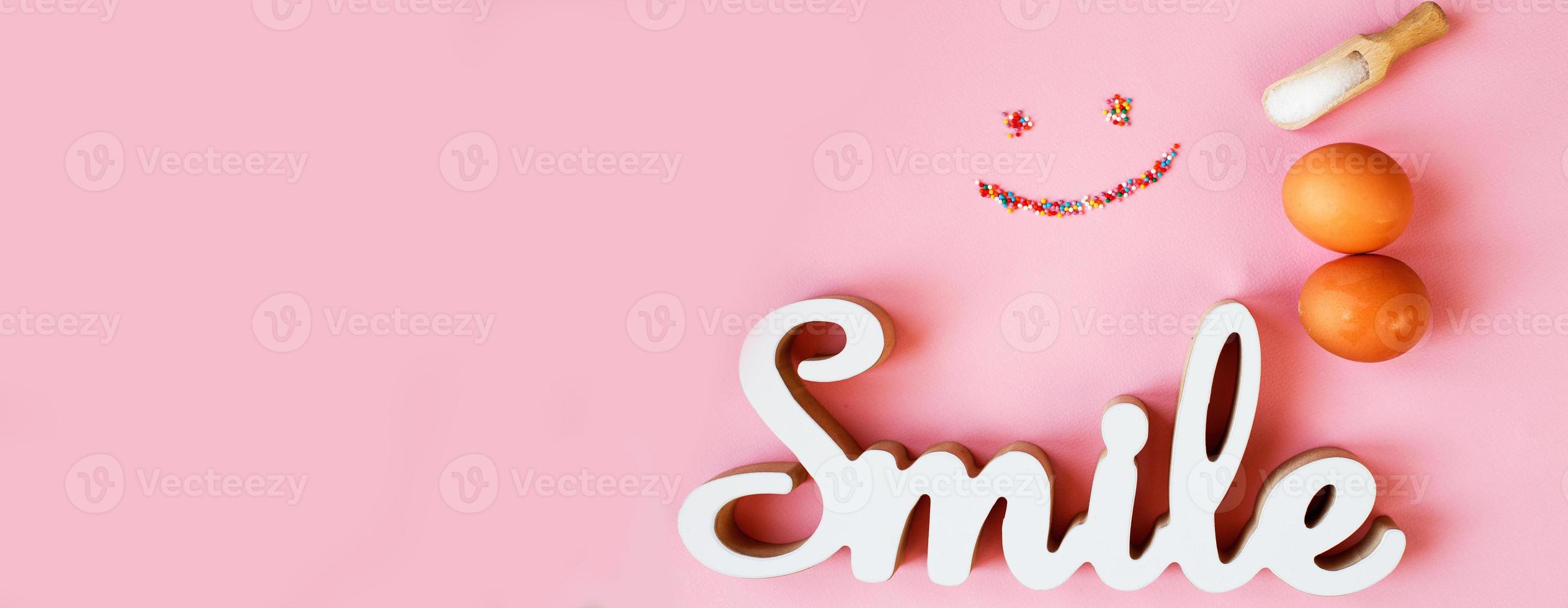 Ingredients for cooking baking - egg, sugar culinary topping on pink background. Concept of cooking dessert. banner photo