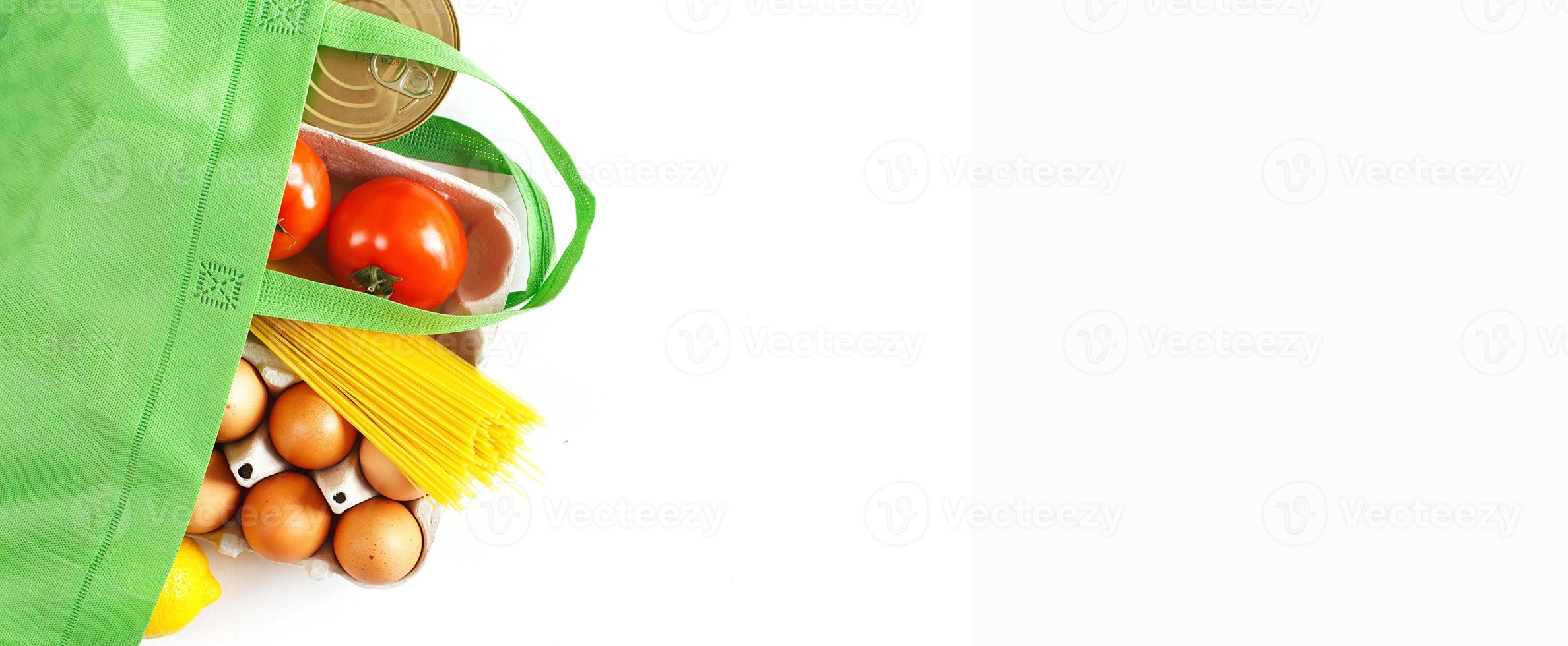 Full green bag of healthy products food on a white background. Top view. online shop. your text. food delivery. banner photo