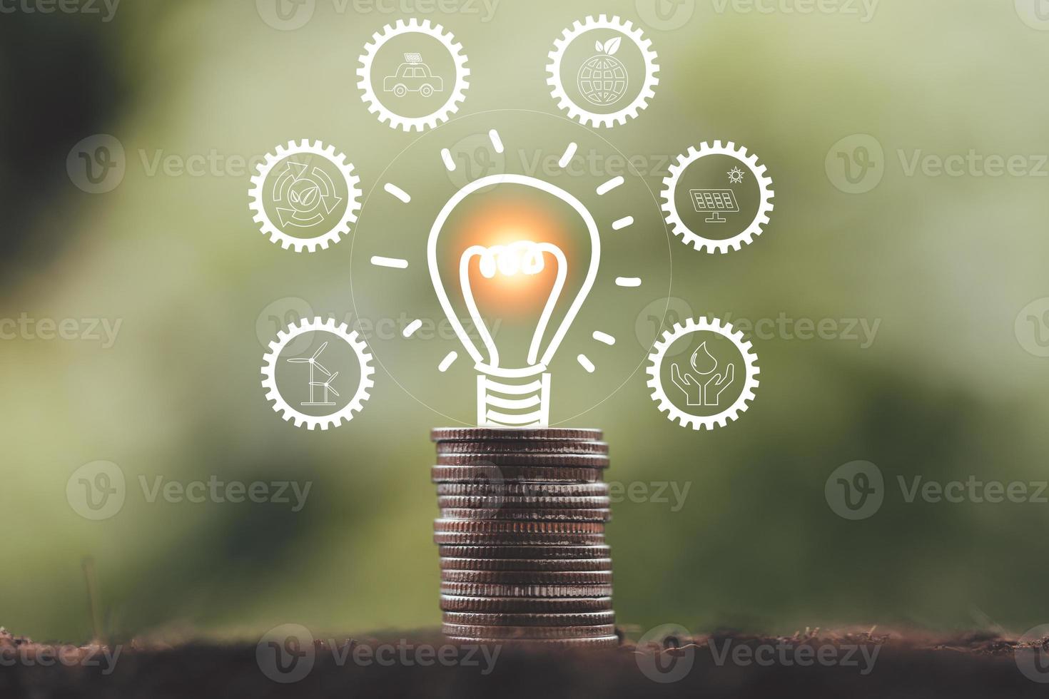 alternative energy, Renewable Energy, saving energy and finance, energy stock investment, lightbulb on coin with eco environment icon. electricity energy source for eco environment. photo