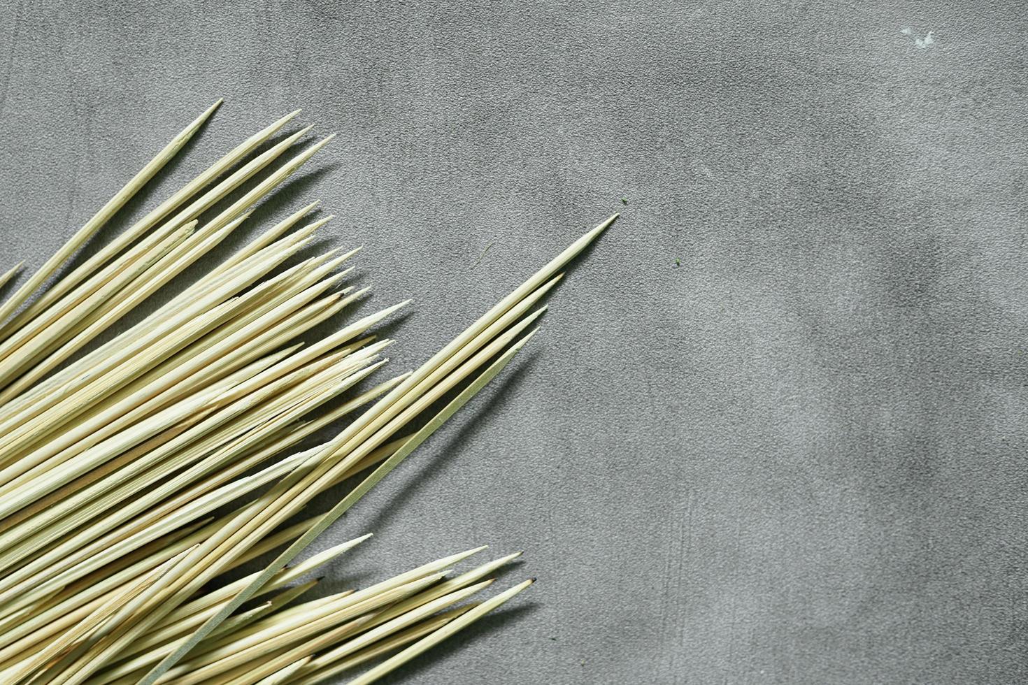 bamboo skewers with concrete background ready to use photo