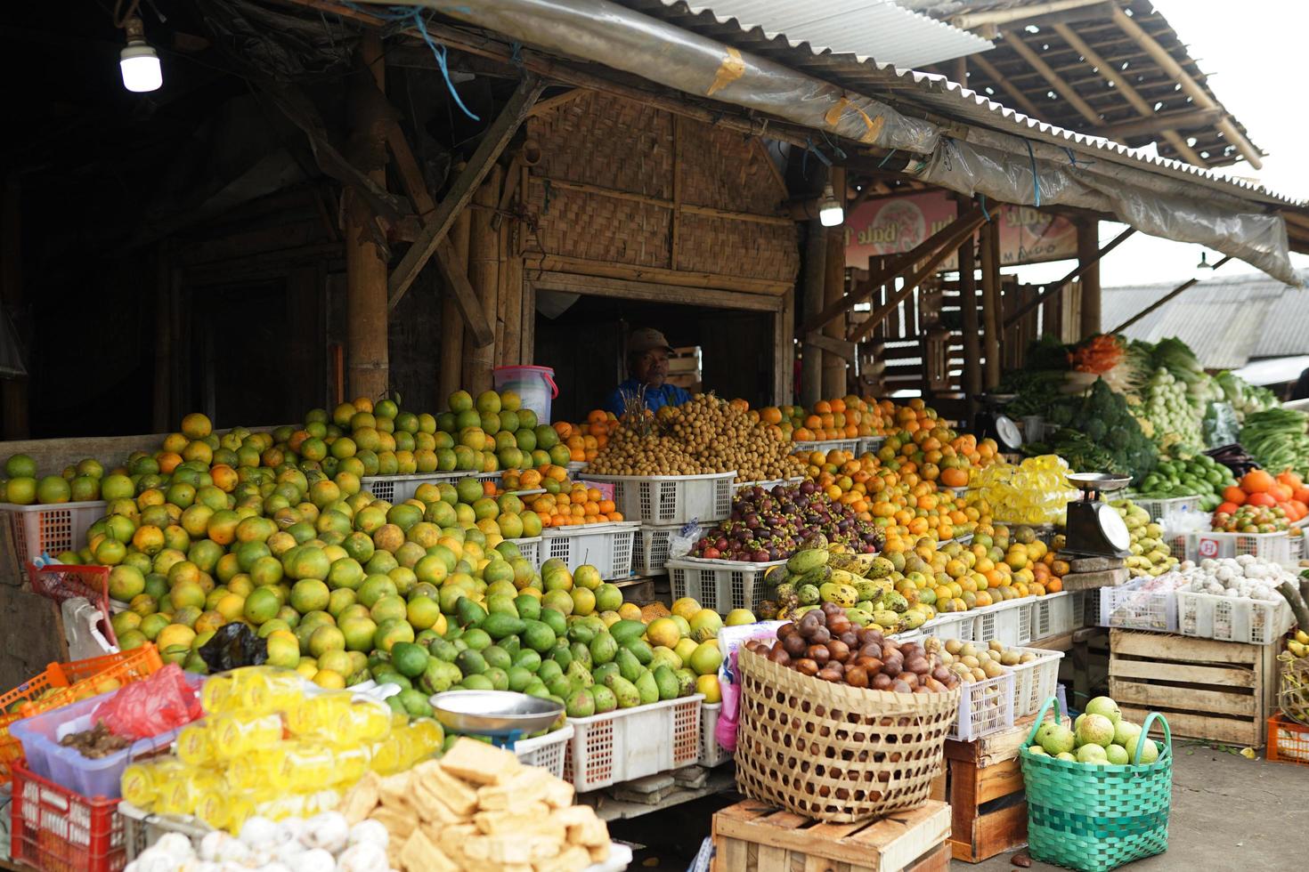 Magelang, Indonesia, 2020 - traditional market selling various types of fruits and vegetables photo