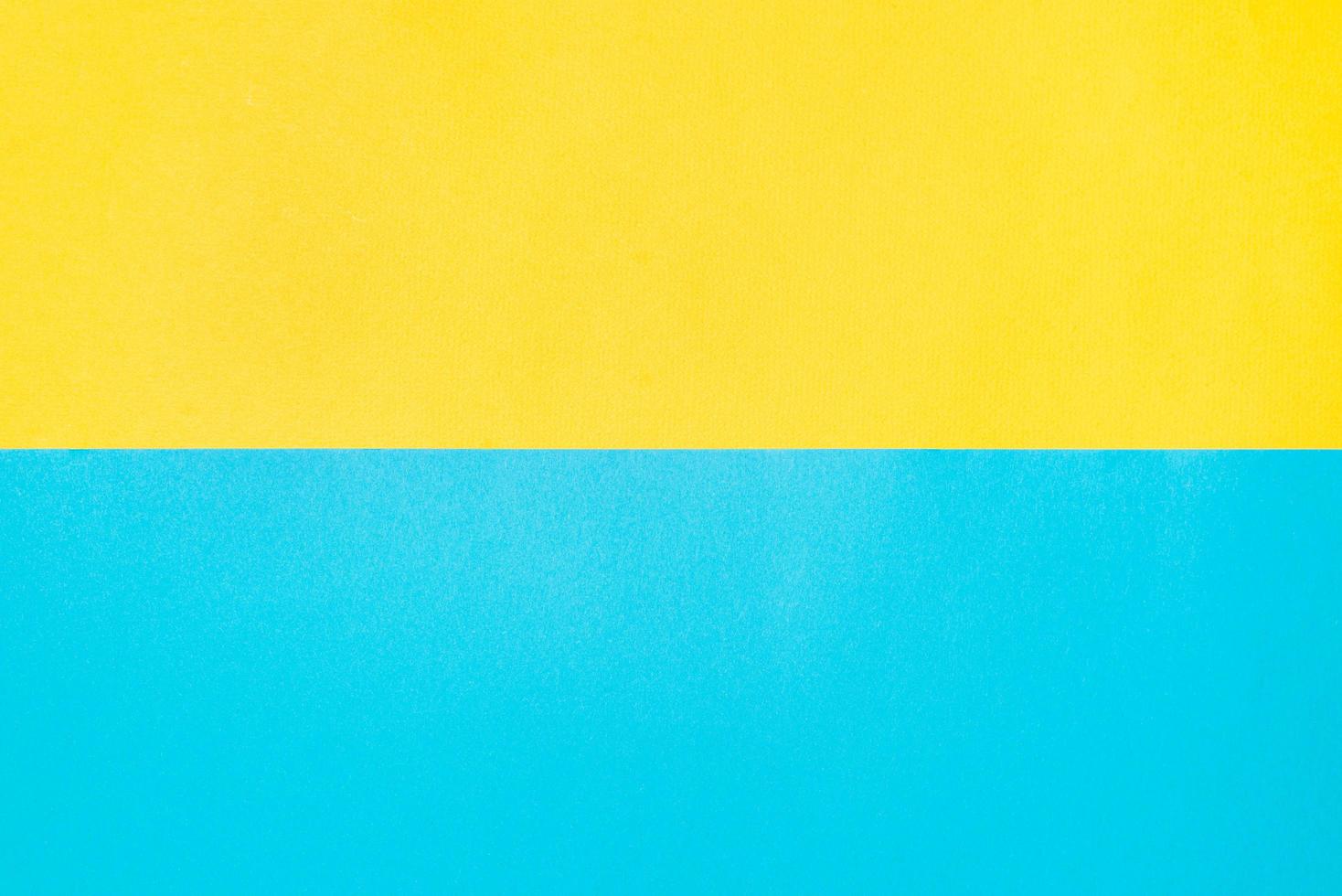 fondo de papel texturizado, vista superior. telón de fondo de color amarillo-azul. dos fondos horizontales foto