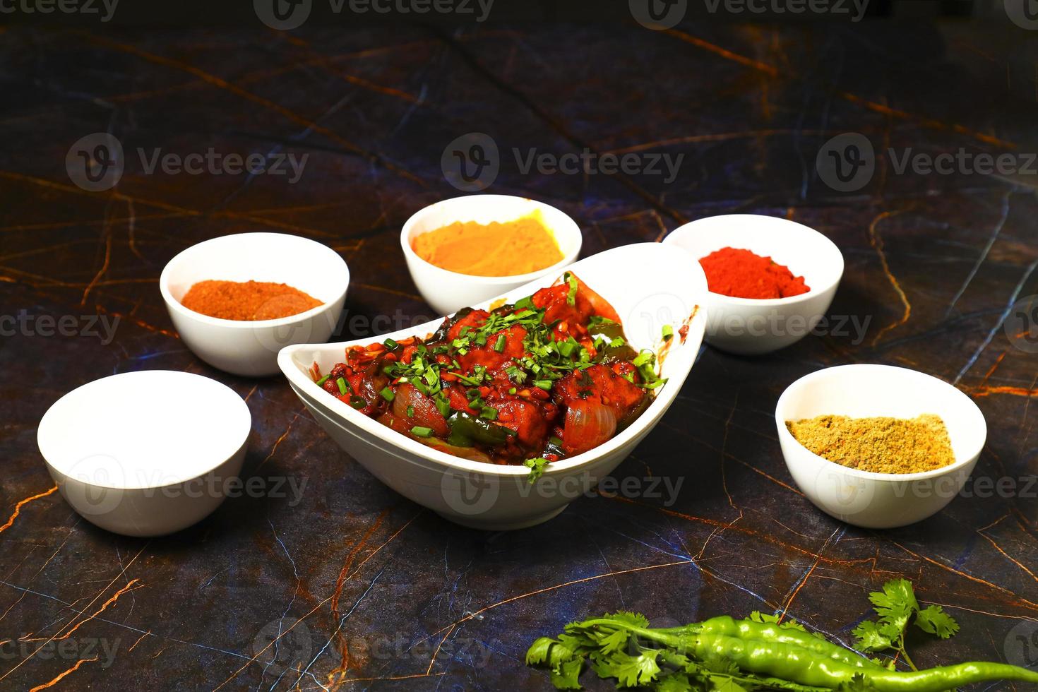 Assorted indian food on black background Indian cuisine Top view photo