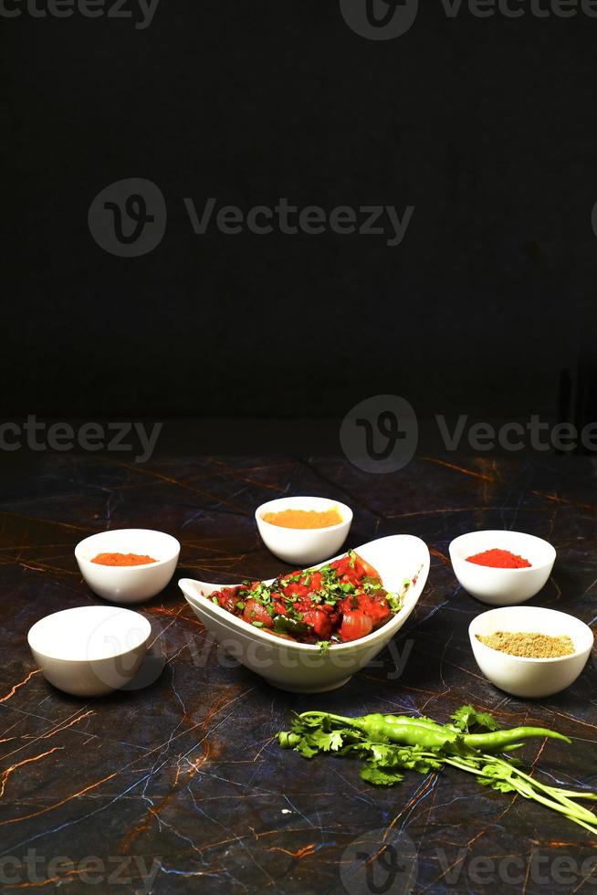 Assorted indian food on black background Indian cuisine Top view photo