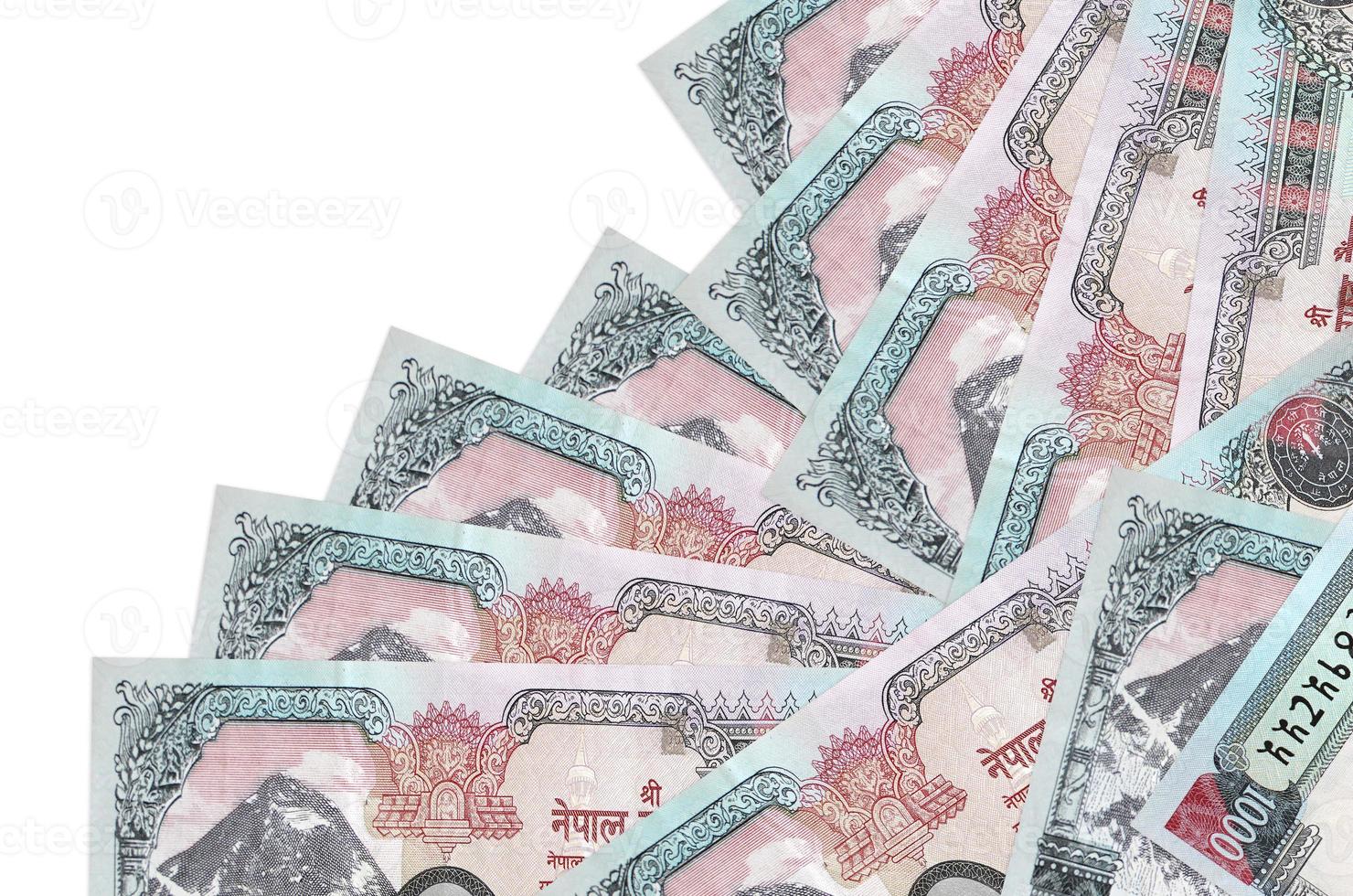 1000 Nepalese rupees bills lies in different order isolated on white. Local banking or money making concept photo