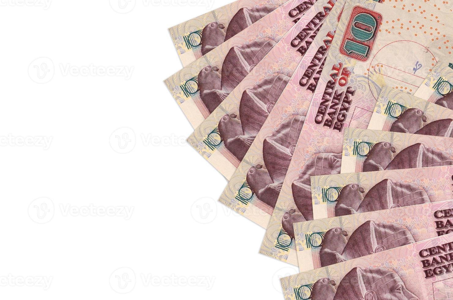 10 Egyptian pounds bills lies isolated on white background with copy space. Rich life conceptual background photo